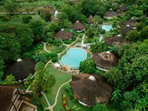 an overhead view of a resort with a pool and trees at Loharano Lodge in Ambaro