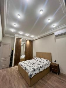 Ένα ή περισσότερα κρεβάτια σε δωμάτιο στο Sea Breeze Polo Residence +19 φωτογραφίες