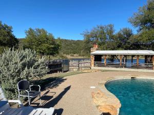 a backyard with a swimming pool and a gazebo at Sundance Club Resort in Gordon