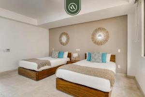 Ένα ή περισσότερα κρεβάτια σε δωμάτιο στο Luxury 4 BR Condo - Amazing Bay View - Pool