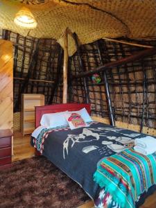 Postel nebo postele na pokoji v ubytování Wasi Andina Lodge + 13 fotografií