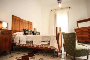 Ένα ή περισσότερα κρεβάτια σε δωμάτιο στο Dimore San Nicol - Noto Centro