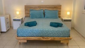 A bed or beds in a room at ''Korifo apartment'' at Benitses