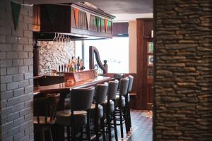 Ο χώρος του lounge ή του μπαρ στο Murphy's Pub and Bed & Breakfast