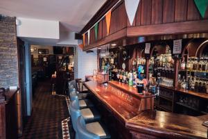 Ο χώρος του lounge ή του μπαρ στο Murphy's Pub and Bed & Breakfast