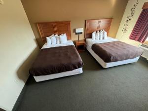 Postel nebo postele na pokoji v ubytování FairBridge Inn & Suites McAlester
