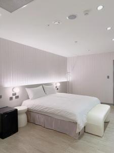 Letto o letti in una camera di 在家行旅 南西館