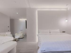 Letto o letti in una camera di 在家行旅 南西館