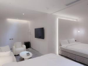 Letto o letti in una camera di 在家行旅 南西館