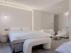 Letto o letti in una camera di 在家行旅 南西館