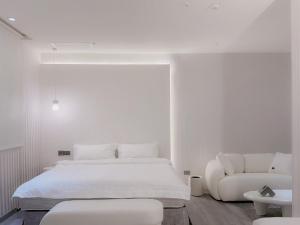 Letto o letti in una camera di 在家行旅 南西館