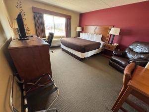 Postel nebo postele na pokoji v ubytování FairBridge Inn & Suites McAlester