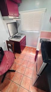 Kuchyň nebo kuchyňský kout v ubytování vogue motel