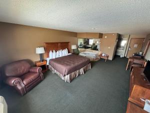 Postel nebo postele na pokoji v ubytování FairBridge Inn & Suites McAlester