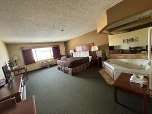 Postel nebo postele na pokoji v ubytování FairBridge Inn & Suites McAlester