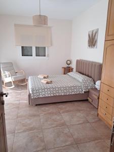 Posteľ alebo postele v izbe v ubytovaní ILIANA.APARTMENTS