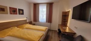 Posteľ alebo postele v izbe v ubytovaní Gasthof Schauer