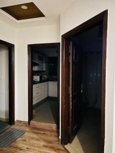 Kuchyň nebo kuchyňský kout v ubytování Comfy Nest