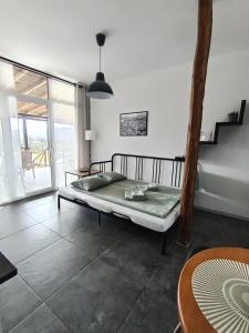 Postel nebo postele na pokoji v ubytování My Place Apartmani