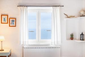Fotografie z fotogalerie ubytování "GOLDEN SUNSET VILLA" 3-BDR, Breathtaking Views v destinaci Batsi
