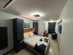 Postel nebo postele na pokoji v ubytování VAMA TAKSİM Hotel