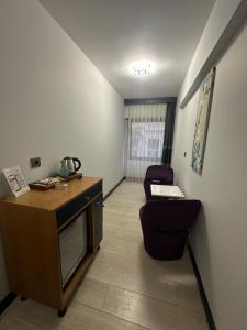 Kuchyň nebo kuchyňský kout v ubytování VAMA TAKSİM Hotel