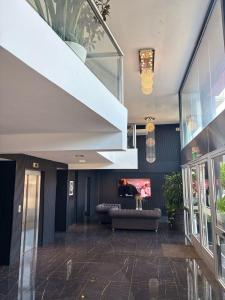 TV a/nebo společenská místnost v ubytování La Gioconda Apart Hotel