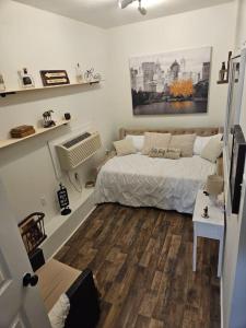 Postel nebo postele na pokoji v ubytování College Park Bungalow