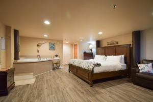 Ένα ή περισσότερα κρεβάτια σε δωμάτιο στο Lakeshore Lodging Lodge 609 +3 φωτογραφίες