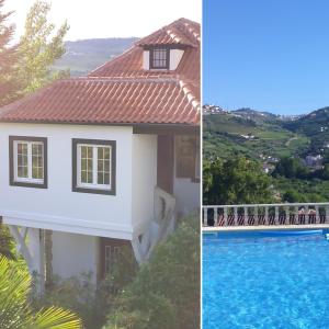 a villa with a swimming pool and a house at Quinta do Fôjo in Lamego