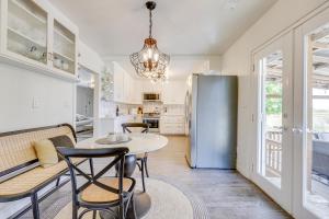 a kitchen with a table and chairs and a refrigerator at Sonoma County Vacation Rental with Vineyard Views! in Sebastopol