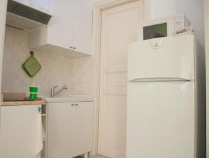 Kuchyň nebo kuchyňský kout v ubytování B&B Le Comari Salentine