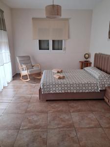 Posteľ alebo postele v izbe v ubytovaní ILIANA.APARTMENTS