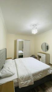 Кровать или кровати в номере شقة فندقية