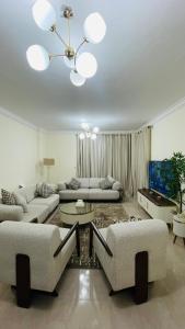 Гостиная зона в شقة فندقية