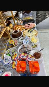 a table topped with lots of different types of food at Motel Liberta in Jajce
