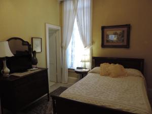 Ein Bett oder Betten in einem Zimmer der Unterkunft Franklin Terrace Bed and Breakfast