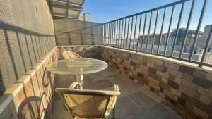 Balcony o terrace sa Jawheret Alswefia Hotel Suite