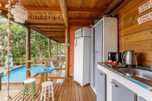 Dapur atau dapur kecil di Suíte Caribe c/ Vista - Sunset View