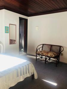 Ένα ή περισσότερα κρεβάτια σε δωμάτιο στο Sobrado Arraial