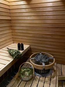 Foto Rovaniemis asuva majutusasutuse Aurora Igloo Fireplace-heated Tents in a secret forest with private Jacuzzi and shared sauna bathroom and dog friendly galeriist