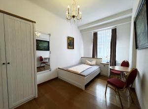 Postel nebo postele na pokoji v ubytování Hotel Zu den Linden