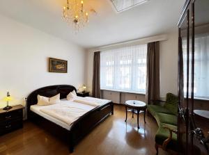 Postel nebo postele na pokoji v ubytování Hotel Zu den Linden
