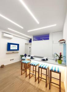 TV a/nebo společenská místnost v ubytování Casa Riva Sorrento