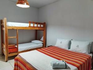 Postel nebo postele na pokoji v ubytování Pousada Bougainville + 47 fotografií