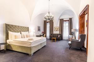 Postel nebo postele na pokoji v ubytování Hotel Arcade
