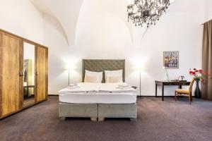 Postel nebo postele na pokoji v ubytování Hotel Arcade