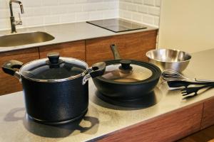 Una cocina o zona de cocina en 京成立石駅 徒歩10分 スカイツリー7分 浅草10分 最大10名 家族滞在 羽田成田空港直通
