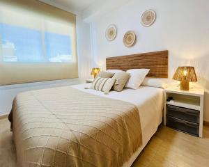 Postel nebo postele na pokoji v ubytování Marina Gaviota Beach + 37 fotografií