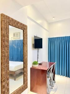 TV/trung tâm giải trí tại Pacific Park Hotel +41 ảnh